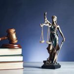 lady-justice-with-hammer-on-book (2) (1)
