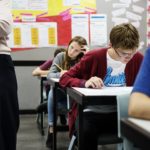 students-doing-the-exam-in-classroom-P388ZC9 (1)