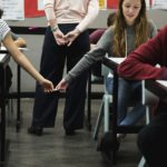 women-students-cheating-the-exam-P2AMUPM (1)