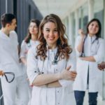 young-female-doctor-posing-in-the-corridor-of-the-hospital-1 (1) (1)