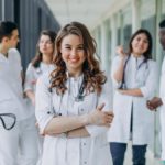 young-female-doctor-posing-corridor-hospital