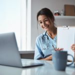 cheerful-female-doctor-giving-online-consultation-2022-01-28-05-22-56-utc