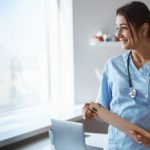 cheerful-female-doctor-holding-folder-with-papers-2021-09-04-14-24-25-utvbc (2)