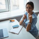 cheerful-female-doctor-working-in-modern-clinic-2021-09-04-14-22-03-utc