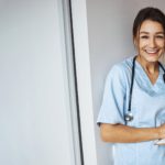 joyful-female-doctor-with-clipboard-standing-in-cl-2021-09-04-14-34-18-utckj (2)