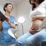 nurse-with-pregnant-woman-during-a-medical-consult-2021-09-01-21-14-36-utcvgh (1)