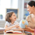 girl-with-teacher-in-classroom-2021-08-26-15-30-09-utc (2)