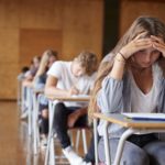anxious-teenage-student-sitting-examination-in-sch-2021-08-26-16-13-44-utc-2.jpg