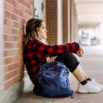 bullied-girl-sitting-alone-school-2.jpg